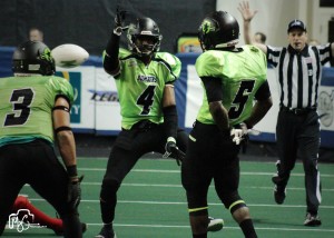 Justice Scales (middle) celebrates with Pompey Festejo (left) and DeWayne Autrey (right) (Photo courtesy of Meghan Oliver-Salina Bombers)