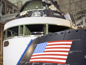 NASA's Orion spacecraft crew module has been stacked on the service module inside the Operations and Checkout Building at Kennedy Space Center -- renamed on July 21, 2014 as the Neil Armstrong Operations and Checkout Building in honor of the legendary astronaut and first man to set foot on the moon, Neil Armstrong-NASA photo