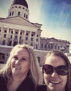 Christine McDonald and September Trible outside the Kansas Capitol on Tuesday