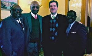 Photo by Kansas Department for Children and Families Gov. Sam Brownback, second from right, recently joined Center for Neighborhood Enterprise officials, from left, Charles Perry, Robert Woodson Sr. and Terence Mathis at the state’s announcement of a new initiative to address poverty-related community issues. 