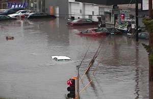 Heavy rain floods streets in Manhattan on Monday evening.