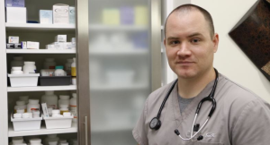 Photo by Kevin Brown/Special to KHI News Service Josh Umbehr operates a direct primary care practice in Wichita where he sees patients who pay him a flat monthly fee. 