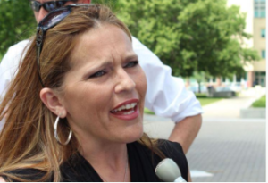 Jennifer Winn, a Wichita business owner, visited the Statehouse on Tuesday to encourage a Senate vote on a bill to legalize cannabis oil for seizure disorders. CREDIT KHI NEWS SERVICE FILE PHOTO