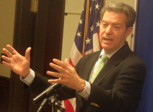 Gov. Sam Brownback's office will work to identify $50 million in budget cuts mandated by the Legislature for the upcoming fiscal year. DAVE RANNEY HEARTLAND HEALTH MONITOR