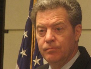 The executive director of a national organization that studies tax policy says Kansas' recent tax increase, signed last week by Gov. Sam Brownback, puts a greater burden on low- and middle-income Kansans.