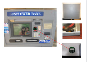 A Salina Police photo of the debit card skimmer device found at the Sunflower Bank ATM on S. 9th Thursday The photo includes a picture of the pinhole camera that was found along with the skimmer.
