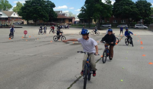 Students at Garfield Elementary School learn bicycle safety skills under the aegis of BikeWalkKC. DAN MARGOLIES HEARTLAND HEALTH MONITOR