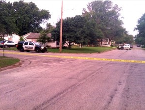 Police on the scene of the June shooting in Hutchinson