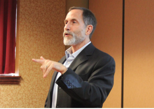 Sheldon Weisgrau, director of the Health Reform Resource Project for the Kansas Association for the Medically Underserved, discussed Medicaid expansion at the 2015 Kansas Conference on Poverty on Thursday in Topeka. ANDY MARSO HEARTLAND HEALTH MONITOR