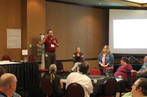 Photo by Andy Marso Steve Gieber, executive director of the Kansas Council on Developmental Disabilities, leads a brainstorming session Thursday during the Kansas Disability Caucus.