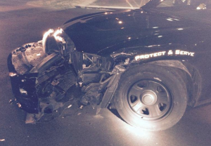 The police officers car where the suspect backed into it-photo Wichita Police