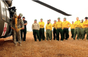 Soldiers with the 2nd GSAB, 1st Avn. Regt., 1st CAB, 1st Inf. Div., conduct cold load training with Soldiers from the 17th FA Bde., assigned to Task Force First Round on Aug. 24 on the Kalispel Tribe of Indians Reservation. (U.S. Army photo)
