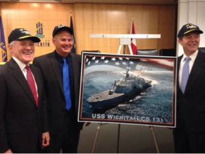 Gov. Brownback celebrating naming of the new USS Wichita with Navy Secretary Mabus and Wichita councilman Jeff Blubaugh.- courtesy photo