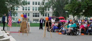 Friday's rally on the south side of the Statehouse was sponsored by the Kansas Department for Aging and Disability Services and various mental health and addiction treatment service providers. CREDIT SUSIE FAGAN / HEARTLAND HEALTH MONITOR