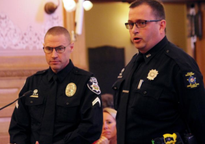 Photo by Dave Ranney Ken Whiteside, left, an officer with the Leawood Police Department, and Tom Keary, an officer with the Overland Park Police Department, testify Tuesday before the Joint Committee on Corrections and Juvenile Justice Oversight.