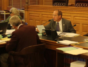 Photo by Andy Marso Sen. Forrest Knox, right, a Republican from Altoona, leads a recent meeting of the Kansas Legislature’s 2015 Special Committee on Foster Care Adequacy. Knox provided a set of notes for the special committee that included links to a high-profile case in Utah in which a judge initially pulled a foster child from the home of a lesbian couple. 