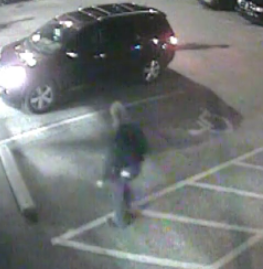 Surveillance video photo showing the suspect taking the vehicle related to the Amber Alert.- Olathe Police Department