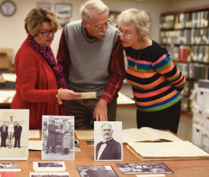 From left, University Archivist Rebecca Schulte, Jim Naismith (grandson of Dr. James Naismith) and his wife, Beverly Naismith. - photo University of Kansas