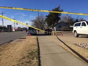 Officers investigate a shooting in west Salina Friday afternoon (Photo by Terry Tebrugge/Salina Post)