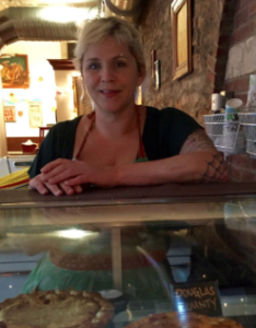 Meg Heriford, owner of the Ladybird Diner, says the Affordable Care Act has allowed her to get affordable health insurance despite a pre-existing condition and open her business in downtown Lawrence. CREDIT JIM MCLEAN / HEARTLAND HEALTH MONITOR 