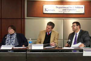 Photo by Andy Marso A mentoring program for Kansans who receive Temporary Assistance to Needy Families payments was unveiled Wednesday during a meeting of the governor’s Social Services Policy Council in Topeka. Council members include, from left, Phyllis Gilmore, secretary of the Kansas Department for Children and Families; Gov. Sam Brownback; and Johnnie Goddard, interim secretary of the Kansas Department of Corrections. -