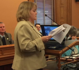 Photo by Allison Kite/KHI News Service Parent Toni Donahue spoke Tuesday to a House committee in support of a bill that would further limit use of seclusion and restraint in schools.