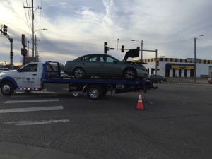 One vehicle involved in a Wednesday sits loaded on a wrecker (Photos by Terry Tebrugge/Salina Post)