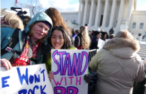 Pictured before the Supreme Court today are Jackie Casteel (left), an abortion rights activist, and Bonyen Lee-Gilmore, spokeswoman for Planned Parenthood of Kansas and Mid-Missouri. CREDIT COURTESY BONYEN LEE-GILMORE
