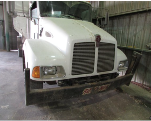 Feed truck that hit the train track prior to the derailment- photo NTSB