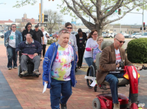 Photo by Megan Hart/KHI News Service Advocates for Kansans with disabilities delivered letters Tuesday to the Topeka office of U.S. Sen. Pat Roberts, a Kansas Republican. They are asking Roberts to co-sponsor Senate Bill 2427, called the Disability Integration Act.