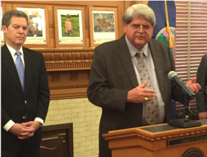 Photo by Jim McLean/KHI News Service Don Gray, general manager of the Kansas City Board of Public Utilities, spoke at a Friday news conference announcing construction of a wind farm in southwest Kansas. The Kansas City, Kan.-based utility will buy 200 megawatts from the new plant, Gray said. At left is Gov. Sam Brownback