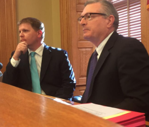 Photo by Jim McLean/KHI News Service Shawn Sullivan, director of Gov. Sam Brownback’s budget office, left, and Raney Gilliland, director of the Kansas Legislative Research Department, spoke Wednesday at a media briefing about revisions to the state’s official revenue projections. 