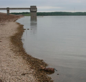 Photo by KHI News Service File Recent Kansas budget cuts may mean delays for stream bank stabilization projects that prevent sediment buildup in rivers and reservoirs. Clinton Lake, shown here, is among the reservoirs that help supply water to people living in eastern Kansas. 