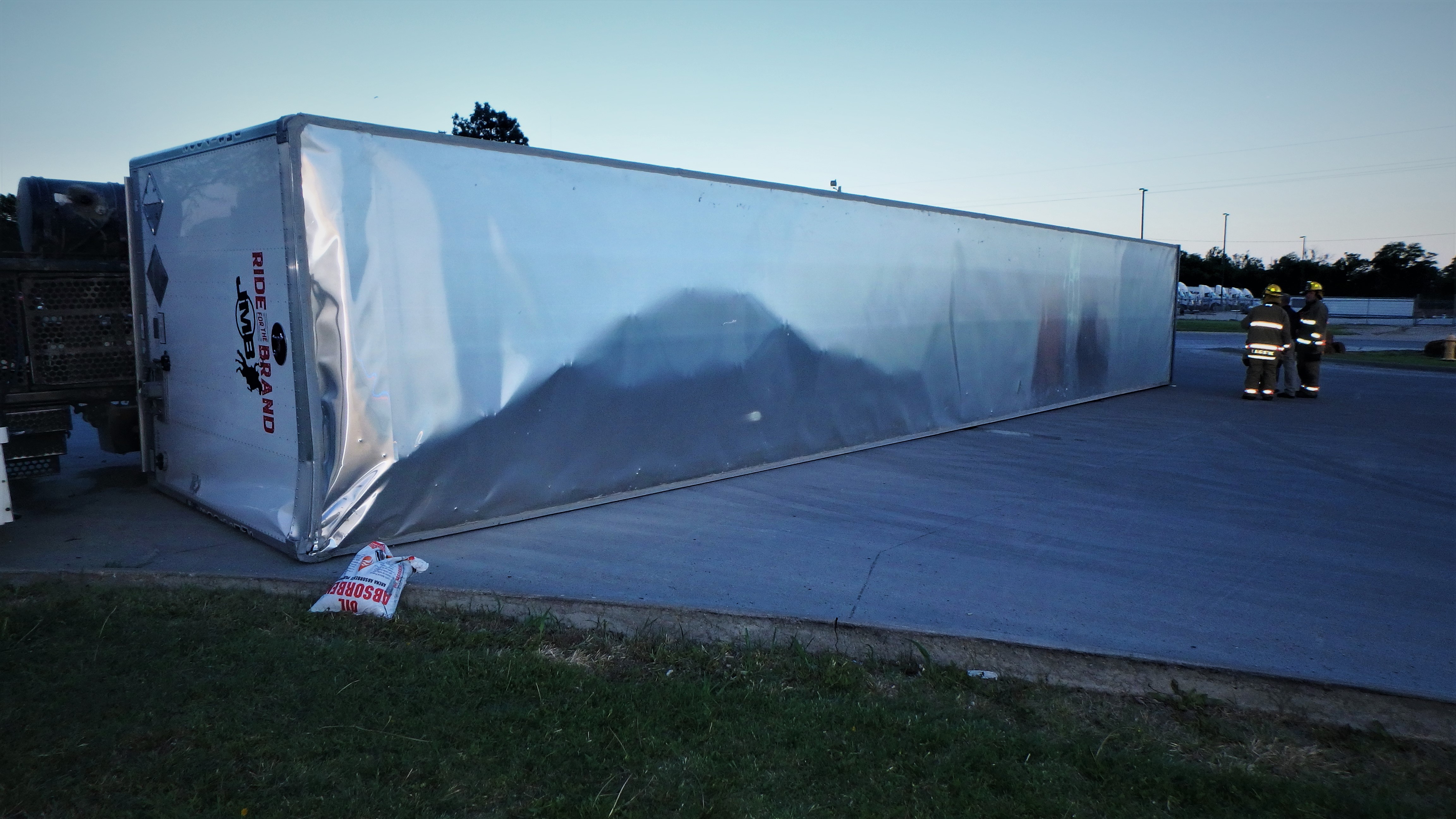 Truck overturns causing batteries to leak at Salina business The