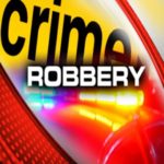 Employee fires gun at suspect during Kansas robbery