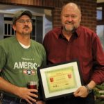 Robert Eaton is presented with the BANK VI Hero of the Week Award