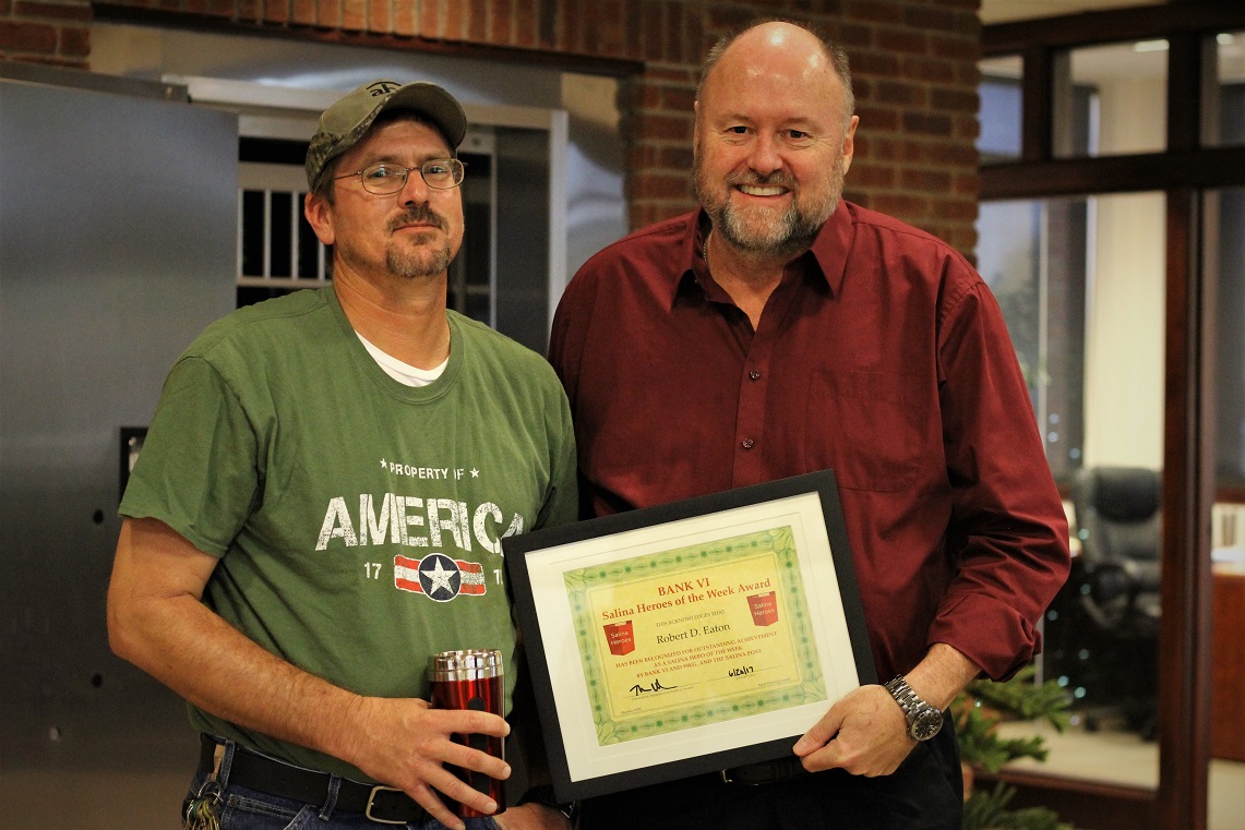 Robert Eaton is presented with the BANK VI Hero of the Week Award The