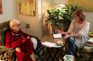 Photo by Andy Marso/KHI News Service The Johnson County Area Agency on Aging provides housekeeping and attendant care services for Julia, left, a 96-year-old who lives in an Overland Park apartment. She met last week with her case worker, Monica Anderson, right. 