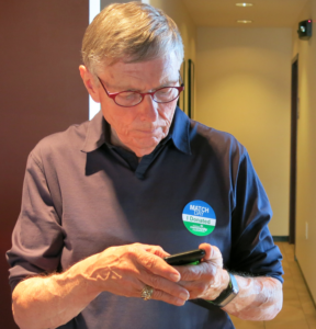 Photo by Elle Moxley/KCUR Ed Berger responds to a message sent to his campaign's Facebook account. Berger is a Republican candidate for Senate District 34 in Reno County.