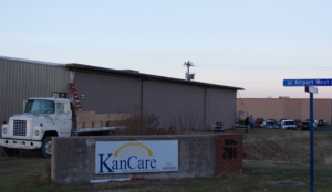 Photo by Andy Marso/KHI News Service File Employees at the KanCare Clearinghouse — a small Kansas Department of Health and Environment outpost at Forbes Field in Topeka — handle calls regarding Medicaid coverage. 