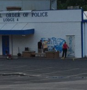 Volunteers clean the FOP building on Sunday- photo courtesy KCTV