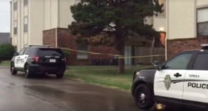 Police on the scene of the murder in Topeka- photo Courtesy WIBW-TV