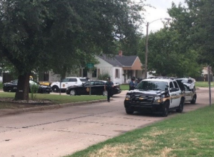 Law enforcement authorities on the scene of Friday's arrest-photo courtesy KAKE