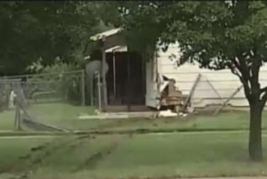 Where the shooting victim crashed into a home early Thursday photo courtesy KWCH
