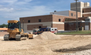 Photo by Jim McLean/KHI News Service Since Mercy Hospital Independence closed in fall 2015, a large portion of the building has been torn down. A garage for city emergency vehicles is being built in its place.