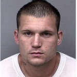 Kansas man charged after motorcycle crash into tree