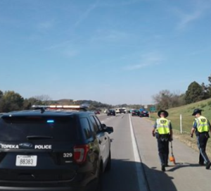 Authorities on the scene of Monday's fatal accident. Photo Topeka Police
