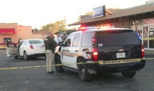 Police on the scene of Wednesday's shooting-photo courtesy KAKE