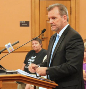 Photo by Stephen Koranda/Kansas Public Radio File Mike Randol, director of the Division of Health Care Finance in the Kansas Department of Health and Environment, told members of the Legislature’s KanCare oversight committee on Friday that the agency intend to slow the KanCare renewal process. 