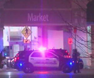 Police on the scene of Sunday night shooting photo courtesy KSHB TV